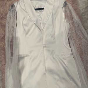 2 piece satin feel suit. Worn once for a wedding.